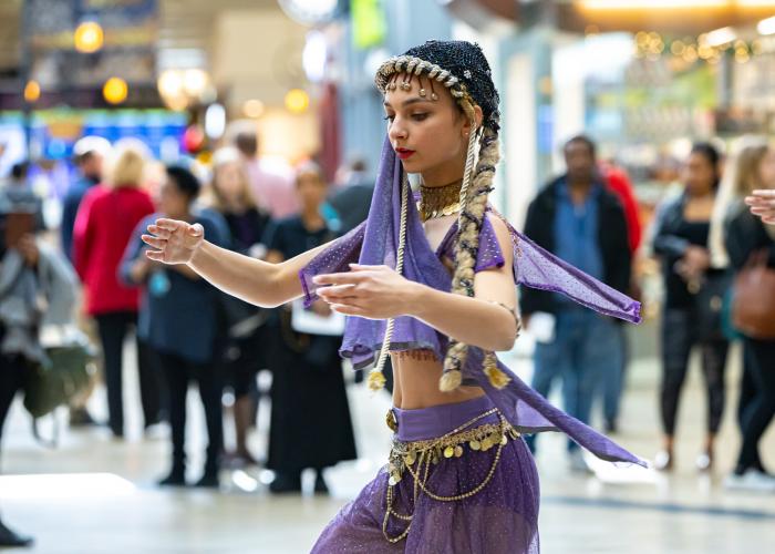young woman performs at terminal 1 during nutcracker ballet performance