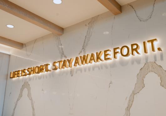 caribou slogan - life is short, stay awake for it 