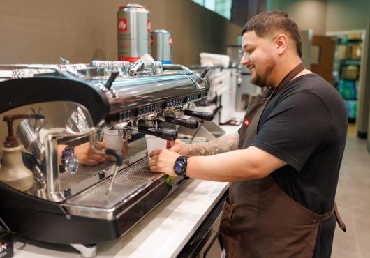 illy barista making a crafted espresso beverage