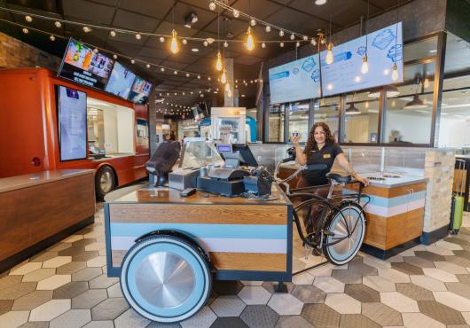 An ice cream counter made out of a vintage bicycle