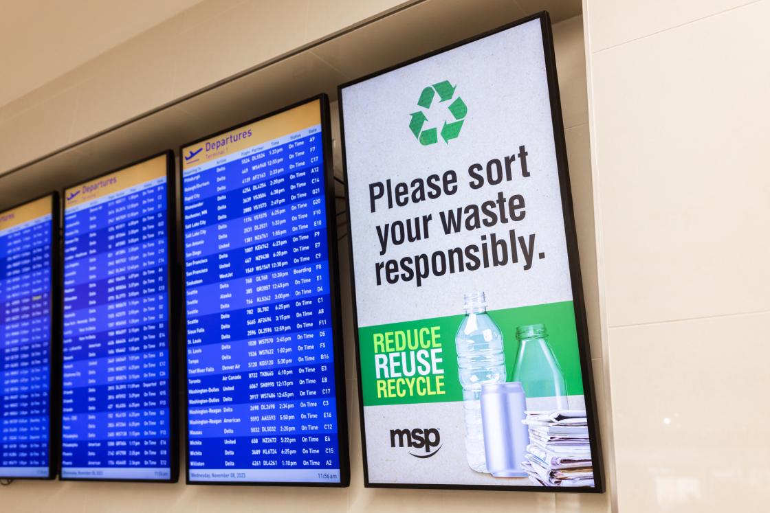 Airport signage encouraging recycling