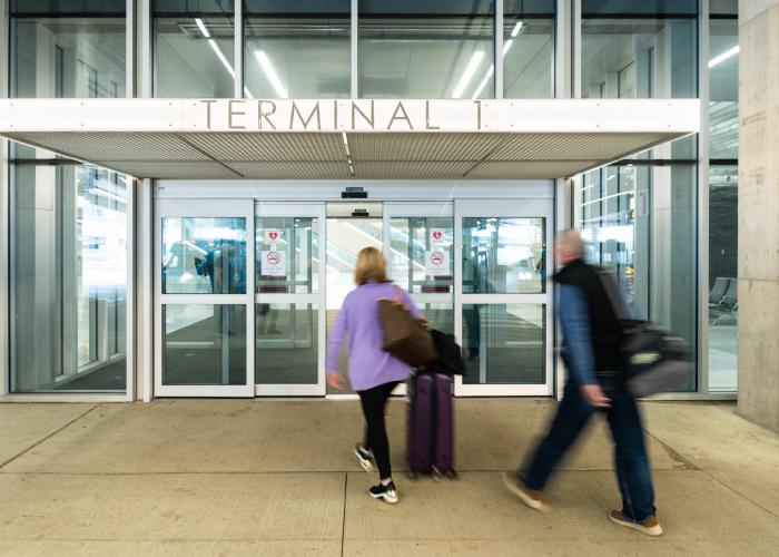 passengers entering airport