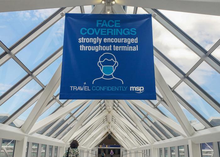 Travel Confidently Face Covering Reminder Banner Terminal 1