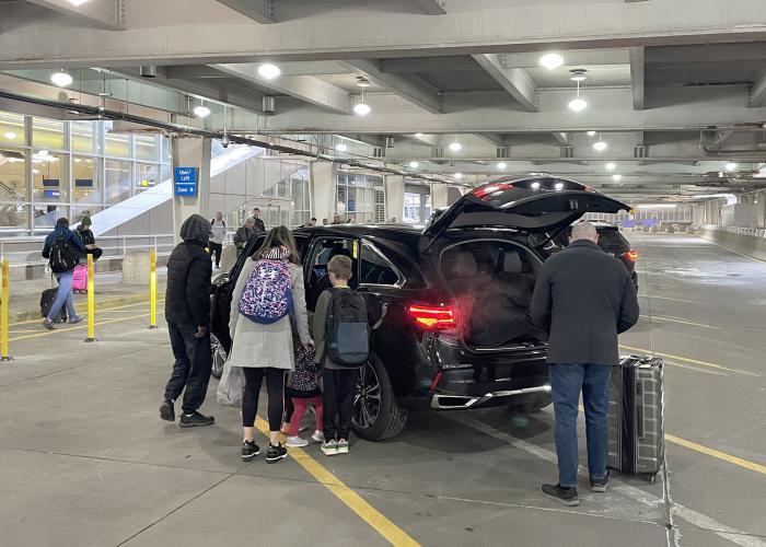 Rideshare customers outside the Ground Transportation Center