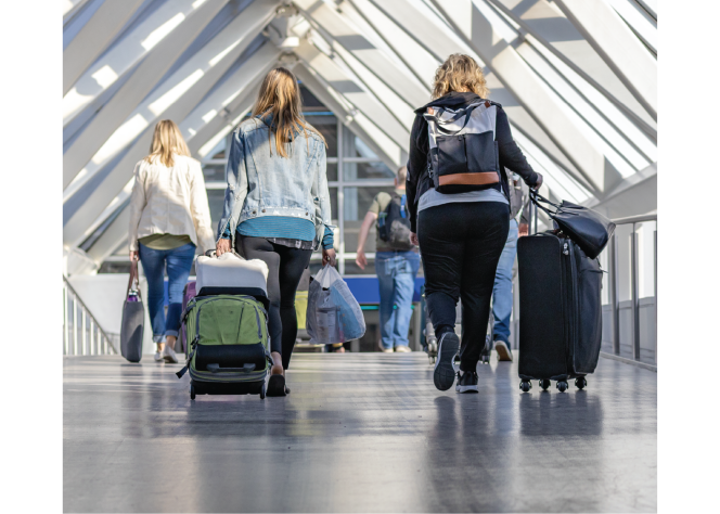 travelers walking through skybridge