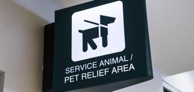 A sign marking a pet relief area